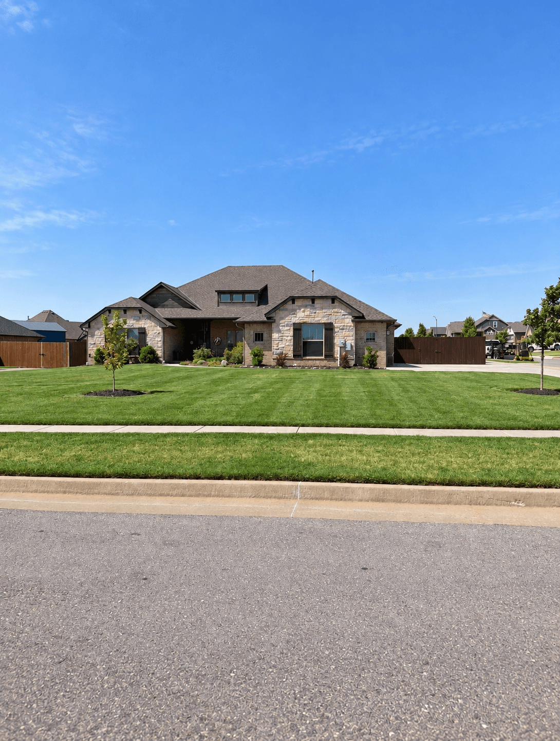 Maintained front yard showcasing Tim's Lawns work